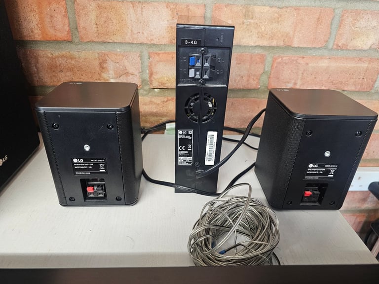 LG SL10YG Dolby Atmos & DTS:X 5.1.2 Soundbar + Wireless Subwoofer & Rear Speakers