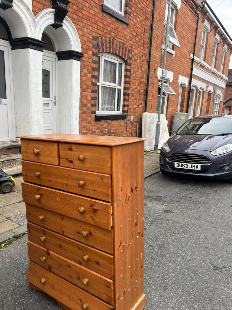 Tall pine chest of drawers 