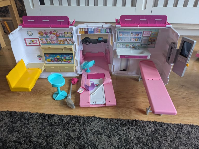 Barbie bundle with dreamhouse, ambulance, Speedboat & Wardrobe