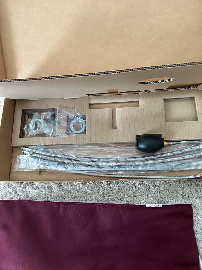 Quooker stainless steel round Fusion tap.