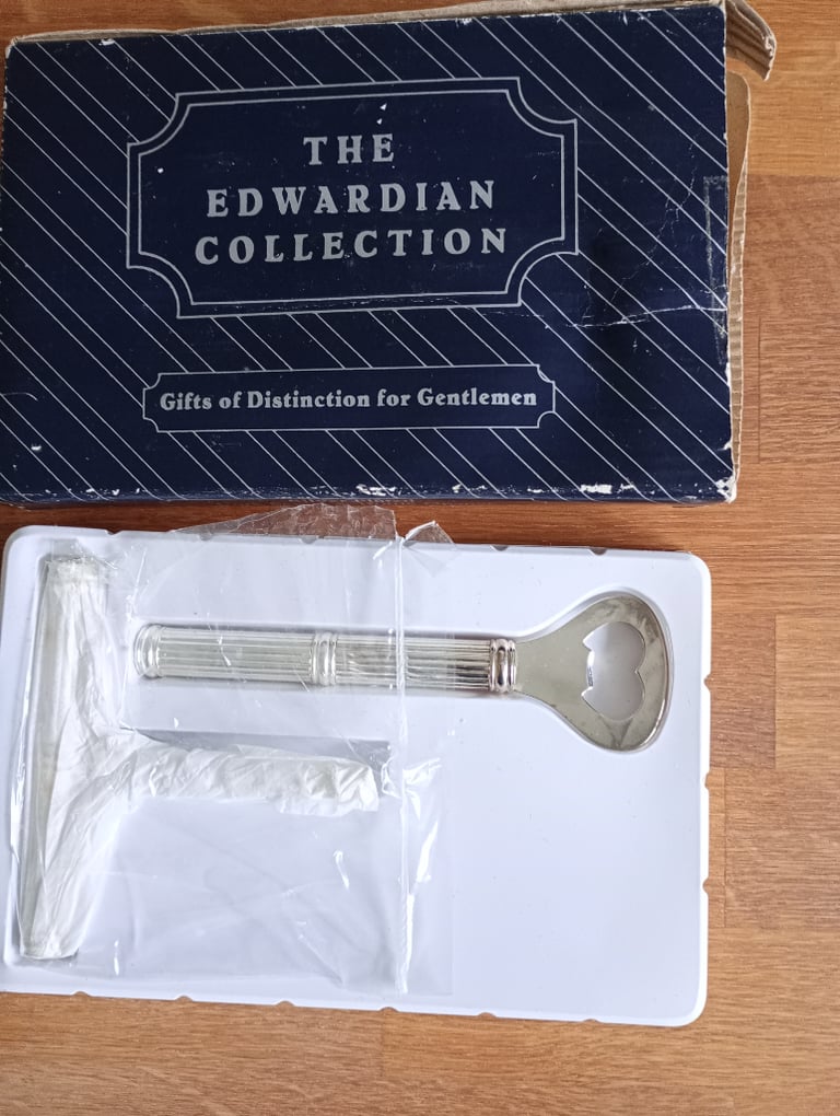 Silver plated cork screw and bottle opener 