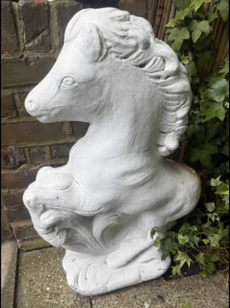 image for white statue of a horse 🐎 