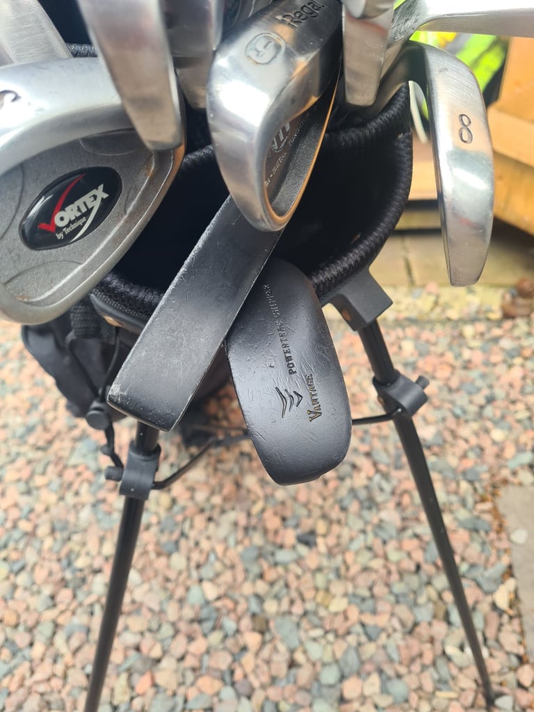 Full set of golf clubs.