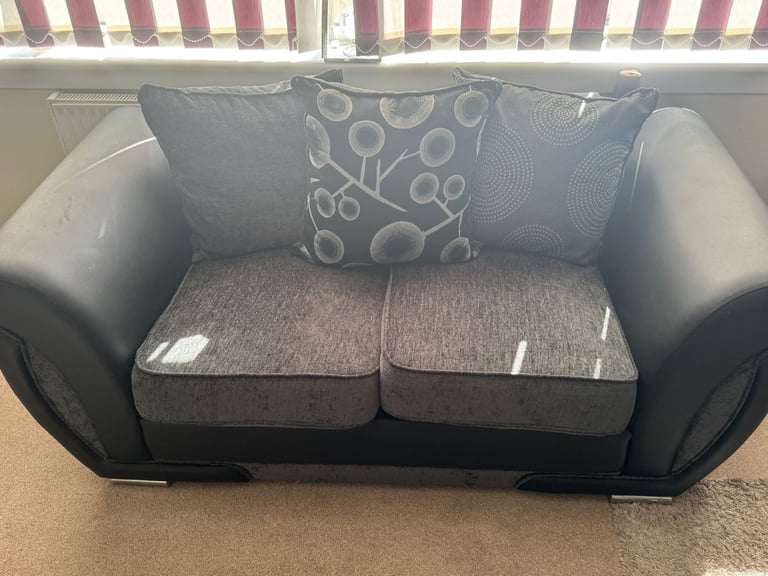 1 x 2 seater sofa and puffe