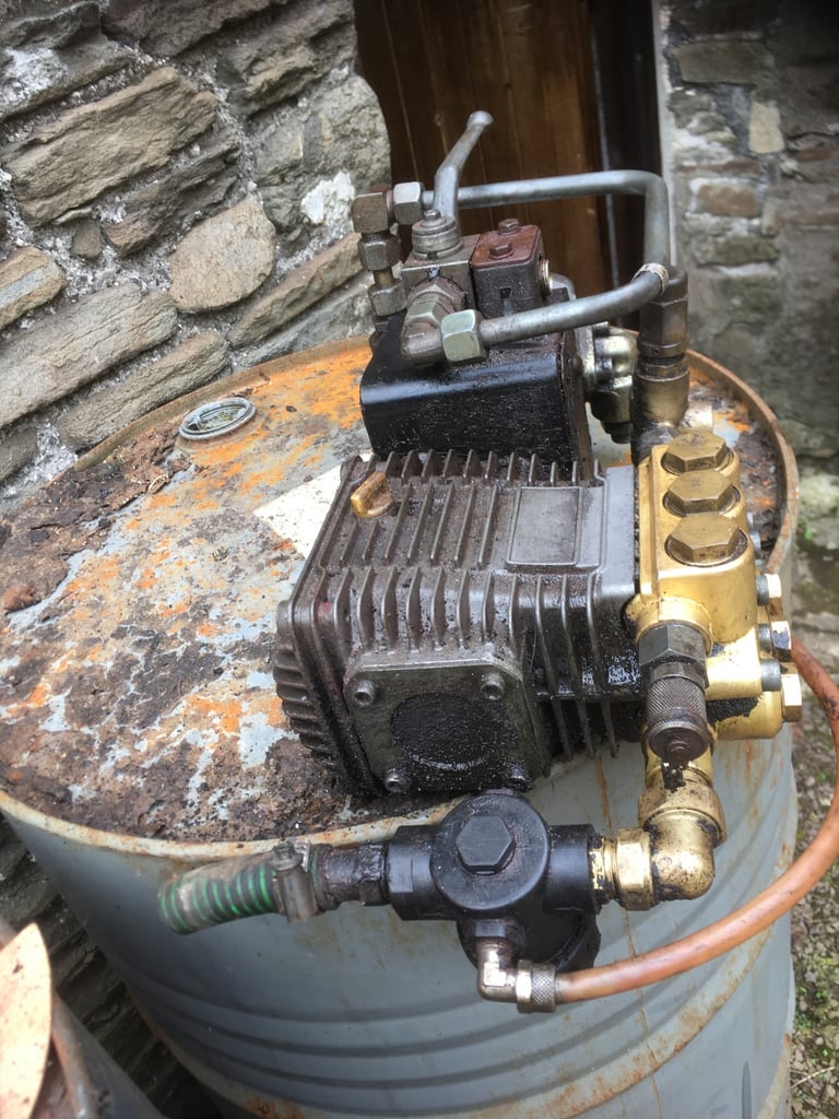 Hydraulic driven pressure washer pump and hose. Real