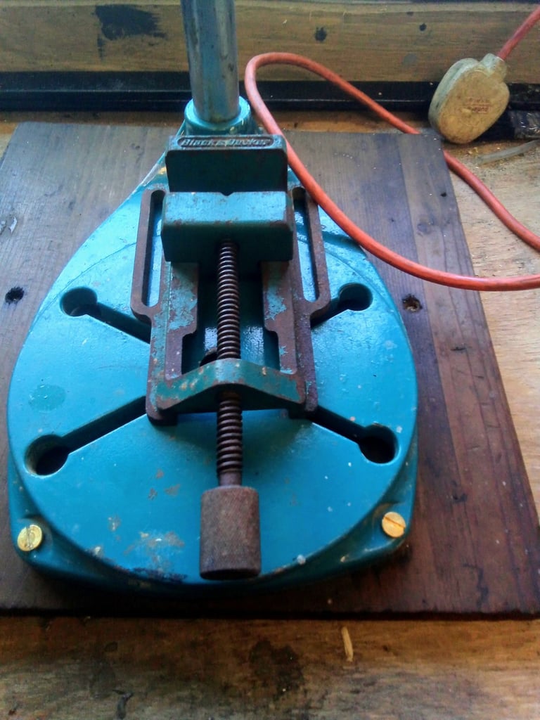 Drill with bench attachment and vice.