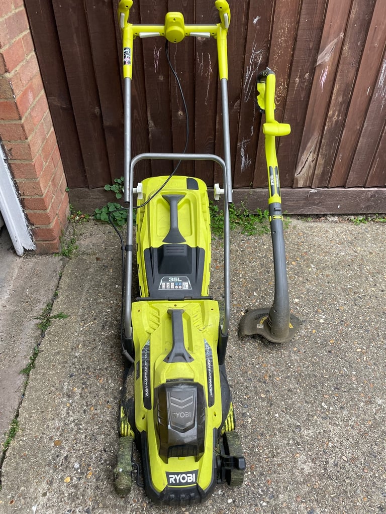 Ryobi one plus lawnmower and strimmer with 2 batteries 