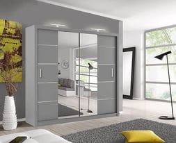 Mirrored Marvel: 2 or 3 Door Sliding Wardrobe with Shelves and Rails