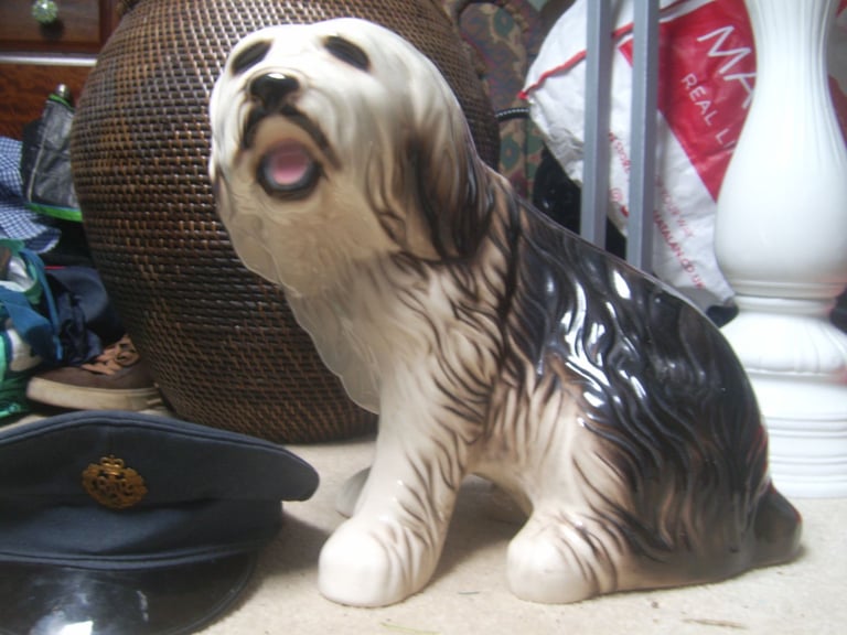 Large ceramic sheep dog ornament