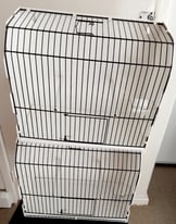2 plastic carrying or display cages