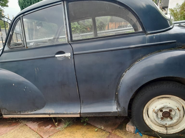 1967 Morris Minor. Black and Leather Red interior