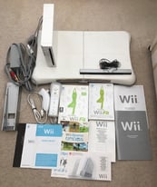 Nintendo Wii video game console bundle plus Wii Fit