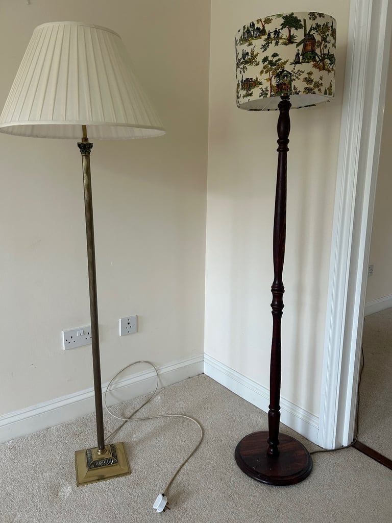 image for One brass and one wooden standard lamp for sale - with shades 