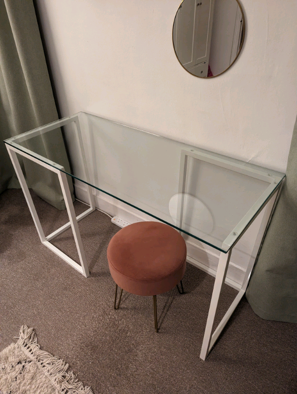 Glass desk and pink stool