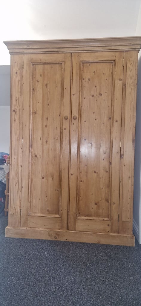 Solid pine wardrobe, draw and bed side table.
