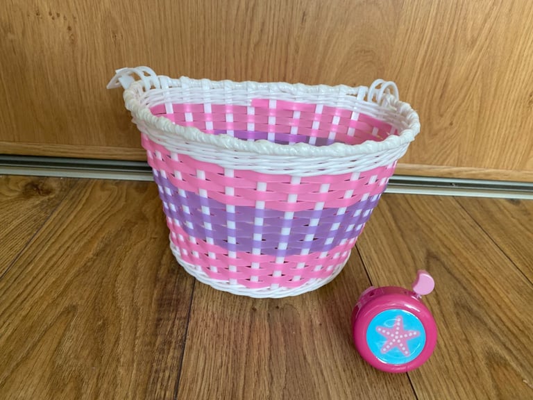 image for Girls pink bicycle basket from Halfords & pink starfish bike bell 