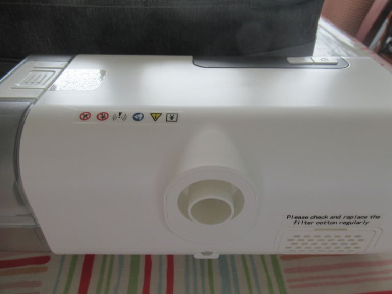 CPAP machine with humidifier, Brand New, with hose holder