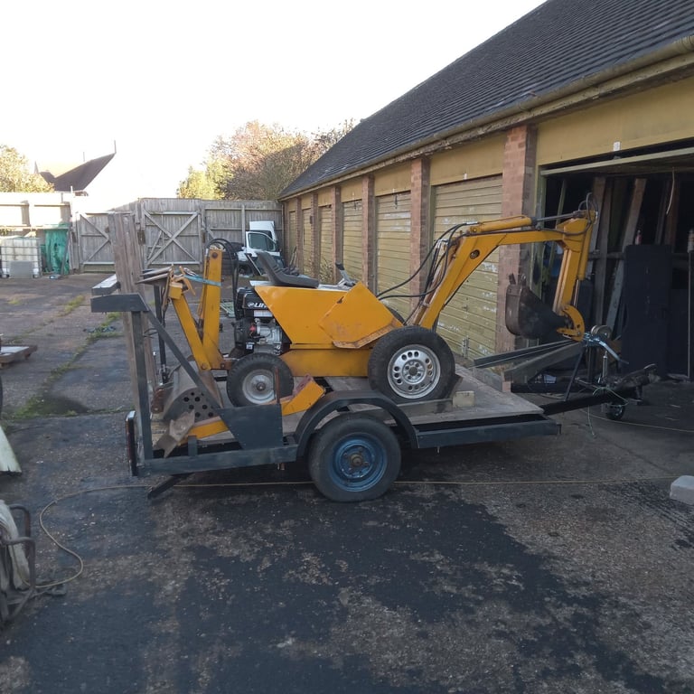 Digger and trailer with ramp and winch, new 13hp engine, spooler and pipes