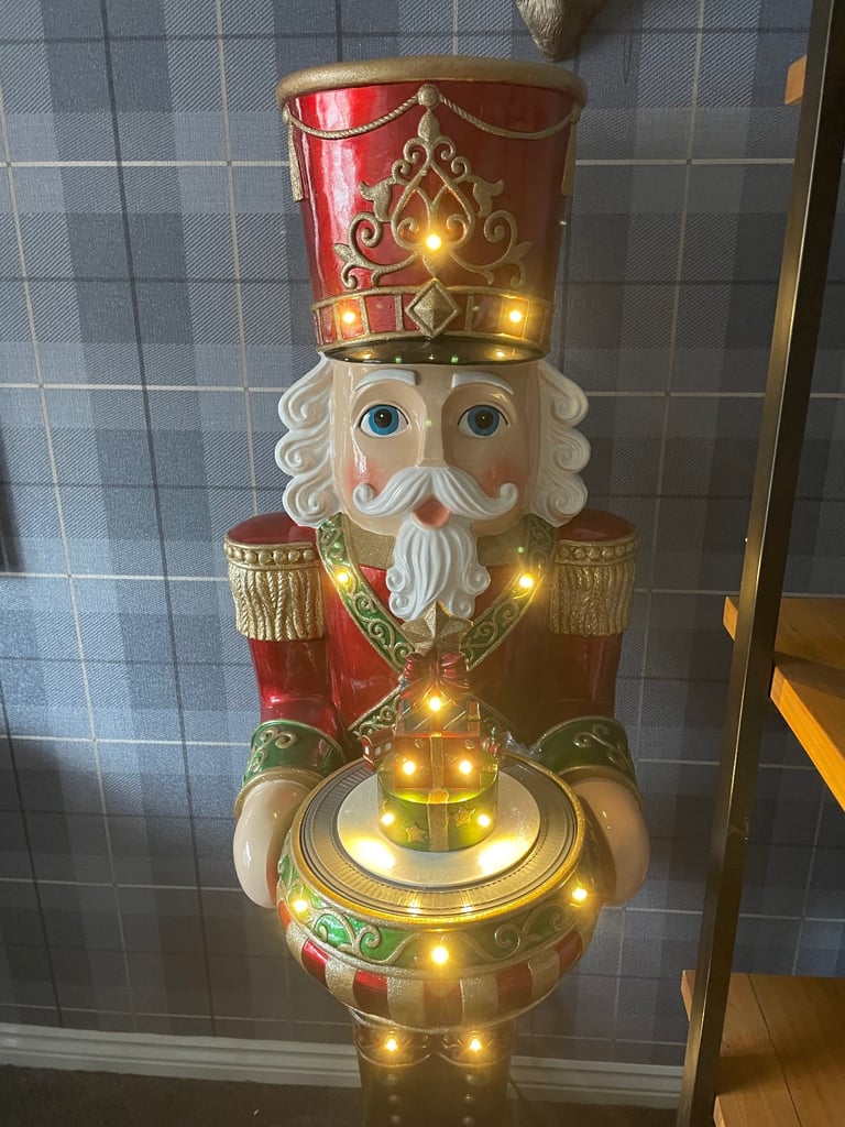 Large Christmas nutcracker 5ft tall lights up and plays music. Like new