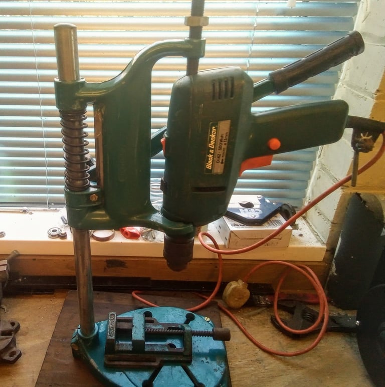 Drill with bench attachment and vice.