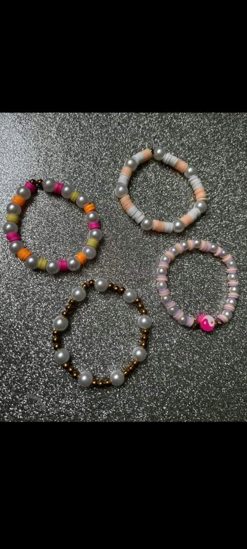 Bracelets any colour's and can add little charms what ever you want al