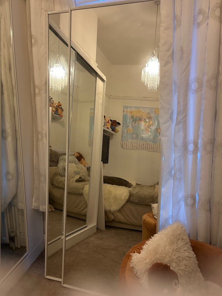 Two sliding mirror wardrobe doors