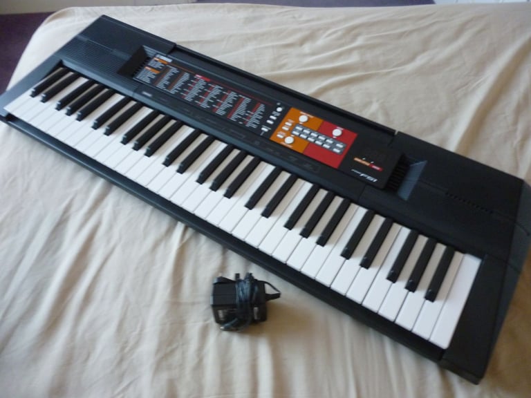 Beautful quality Yamaha Psr F51 full size light weight keyboard,hundreds of voices,styles etc..