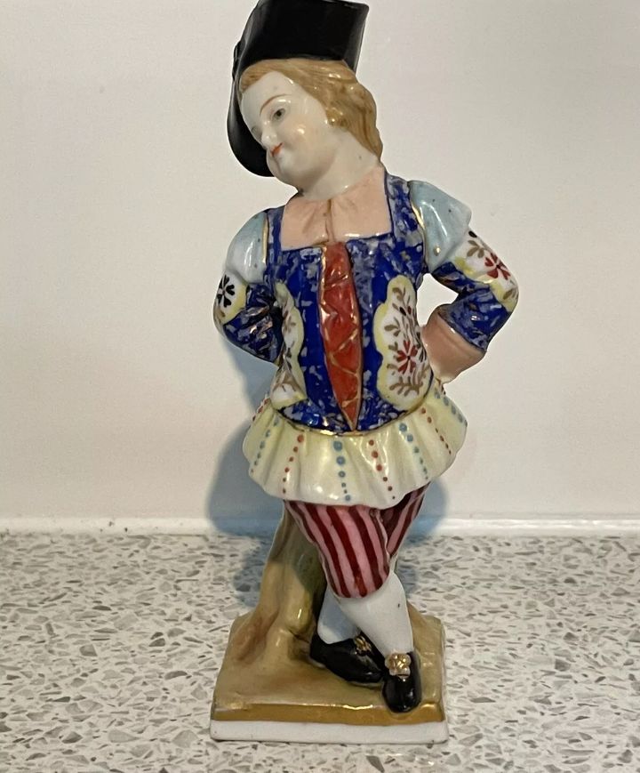 image for ANTIQUE  PORCELAIN BOY FIGURINE/ORNAMENT. ROYAL COMMISSION GERMAN POTTERY. PORCELAIN . 