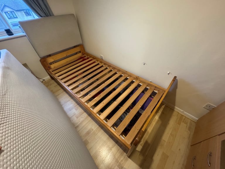 image for IKEA Pine Wood Single Bed with roll out drawers 