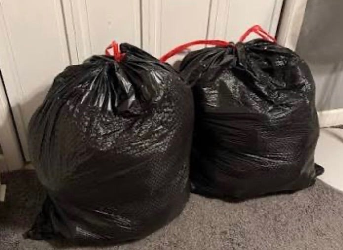 image for 2 black sacks of boys clothes 