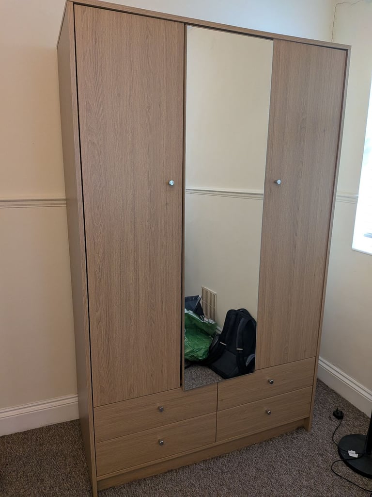 Freestanding wardrobe with mirror