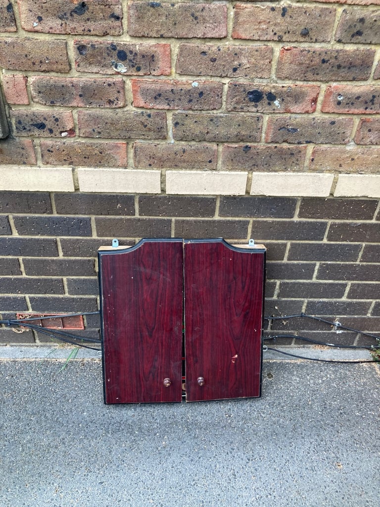 Winmau dartboard with cabinet