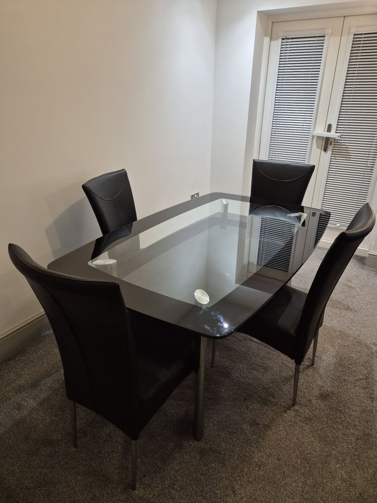 image for Black Dining Set - double glass table with 4 leather chairs