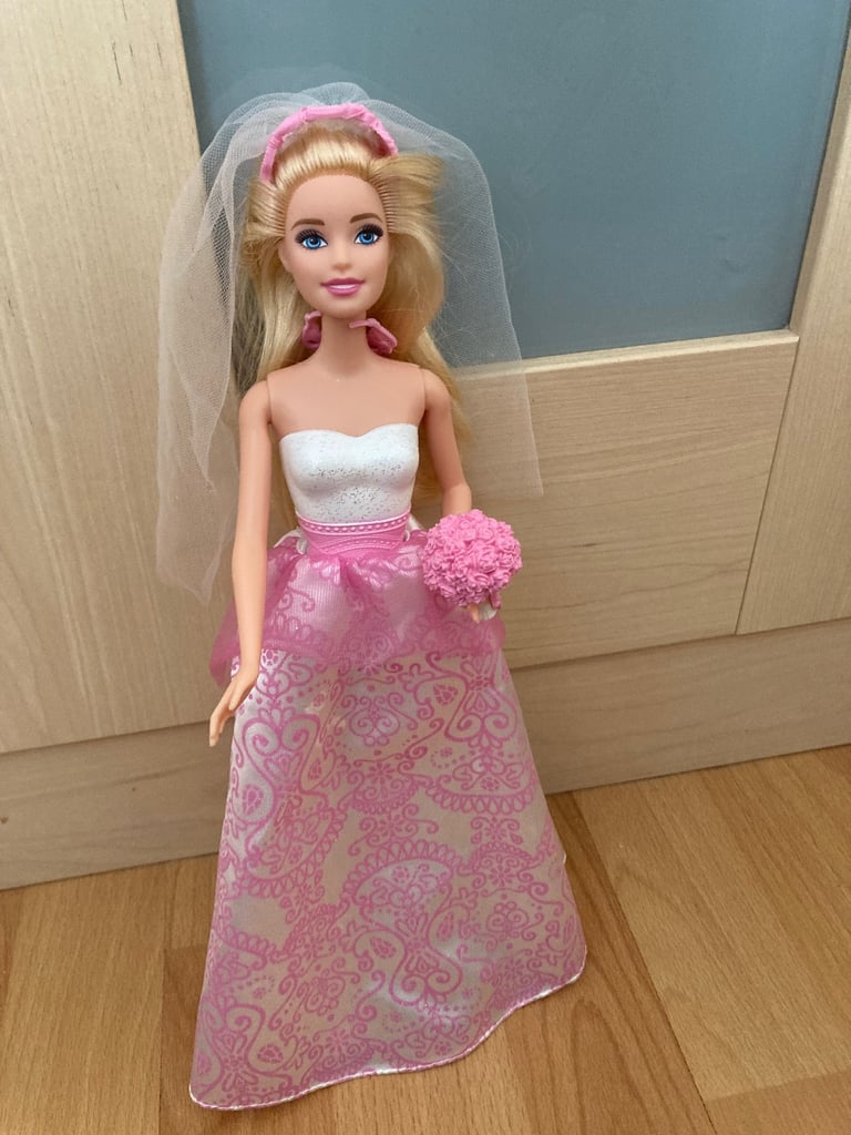 2 x Barbie dolls with accessories