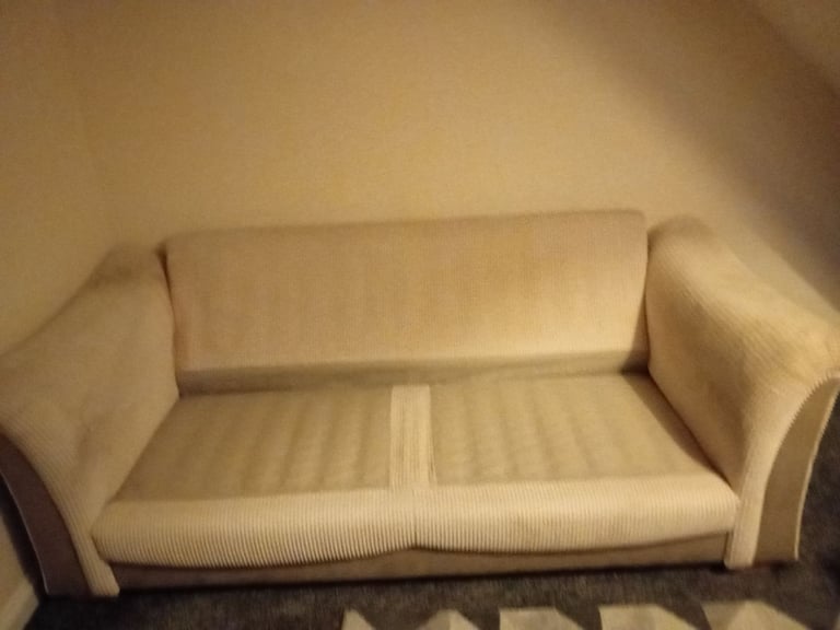 Two piece cream sofa