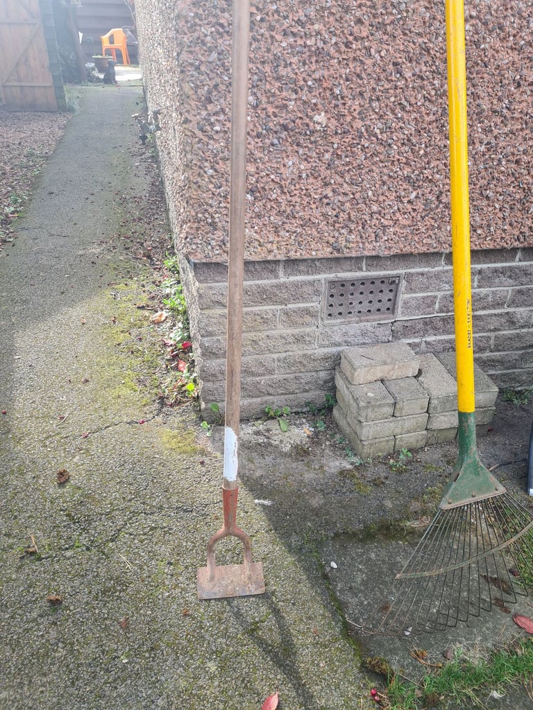 Garden tools snow shovel leaf rake loppers hoe