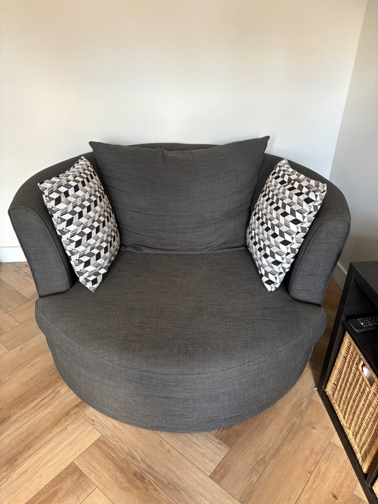 image for Grey DFS sofa and Cuddle swivel chair
