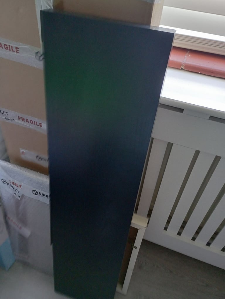 Black floating shelf without screws or equipment