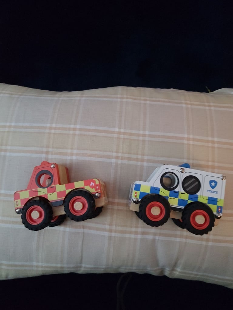2 wooden toy fire and police cars