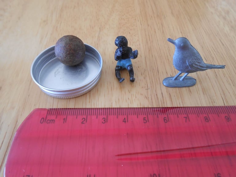 image for Old items - 2 small lead figures and a musket (?) ball sold as one lot