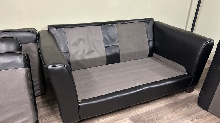 Black leather sofas 3&2