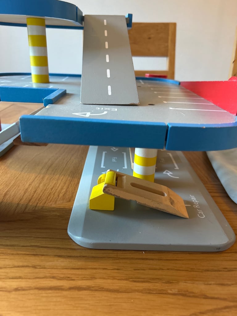 Toy wooden car park used 
