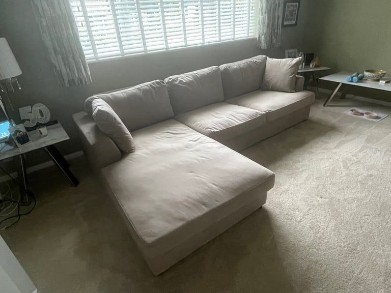 Under a year old sofa with chaise lounge