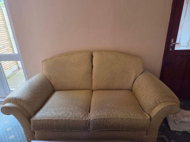 Yellow-gold 2 seater sofa