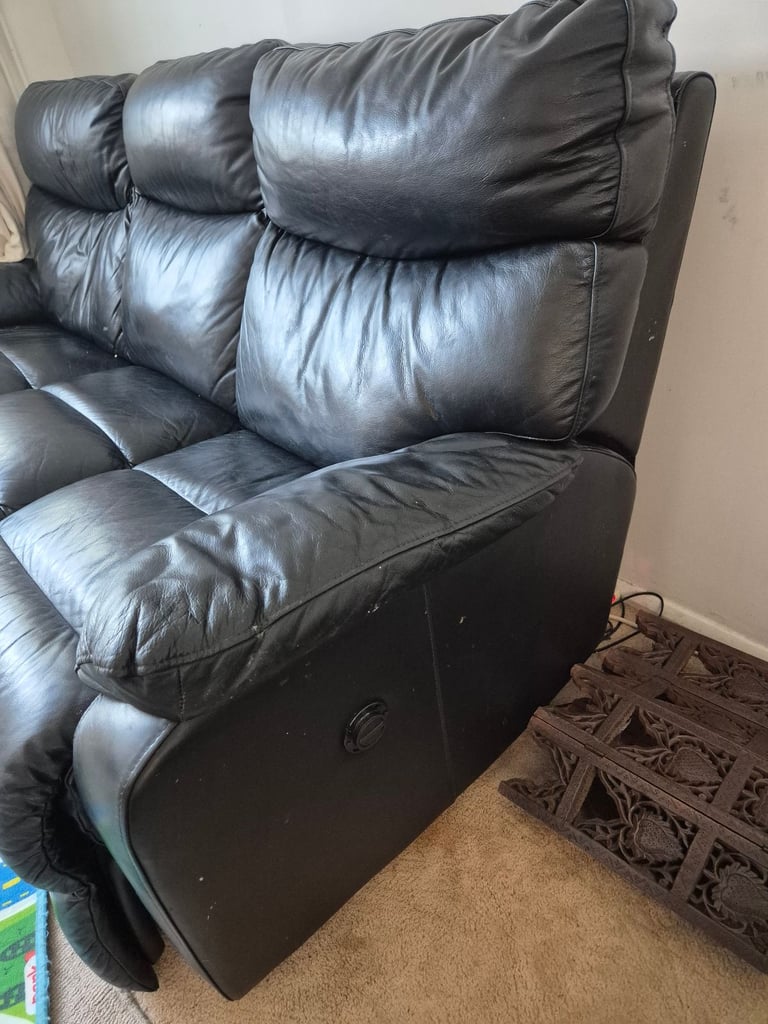 Black leather reclining 3 seater sofa 