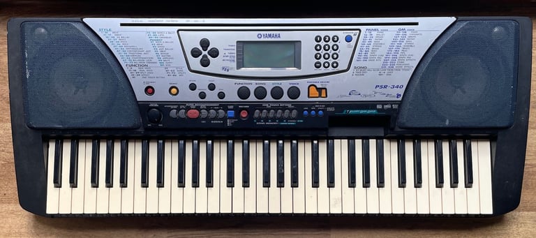 image for Yamaha Portatone PSR-340 Electronic Keyboard 61-Key with Power Adapter