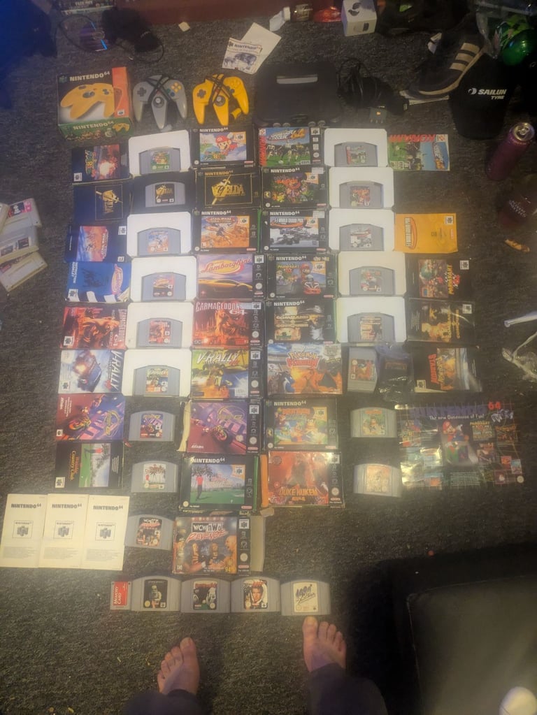 N64 game console and boxed games 