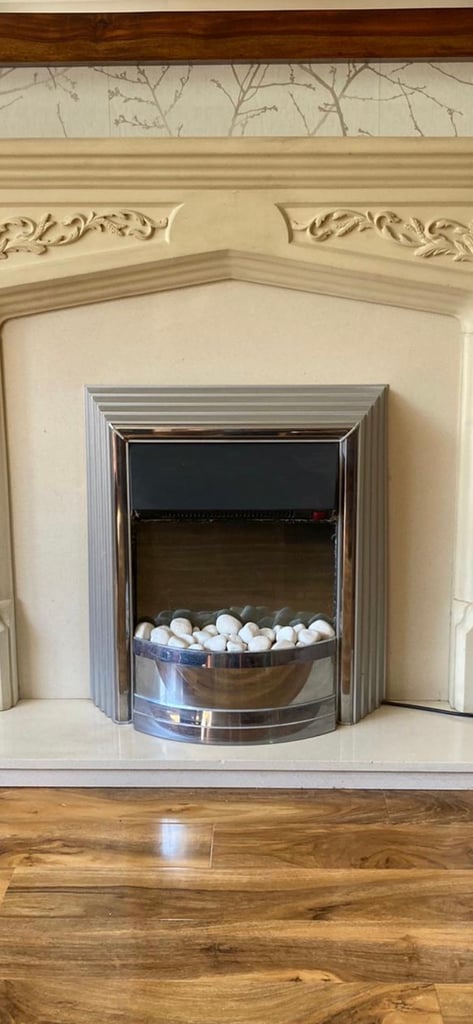 Stone marble fireplace and electric fire
