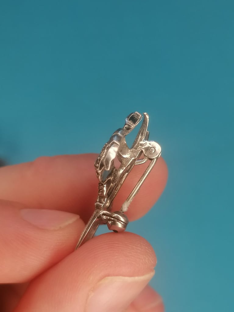 VINTAGE Brooch. Skier in mid - jump. 800  silver brooch. (missing one part as seen).