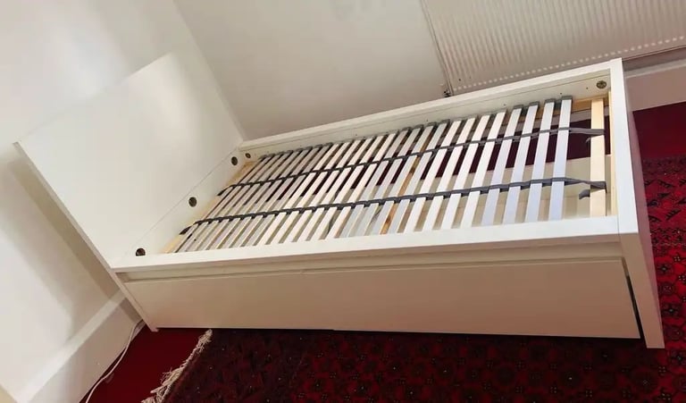 Ikea bed with storage drawers and slated bed base